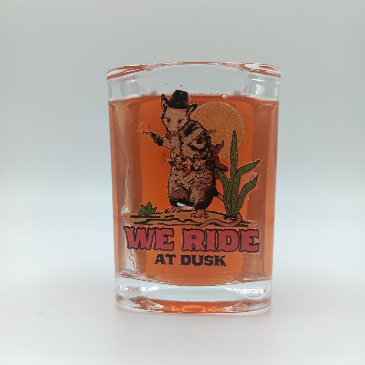 Opossum Cowboy: We Ride At Dusk Shot Glass