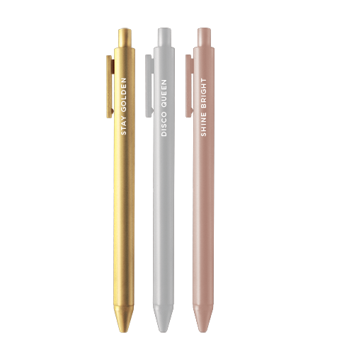 three metalic roller ball pens with mantras, "stay golden" "disco queen" "shine bright"