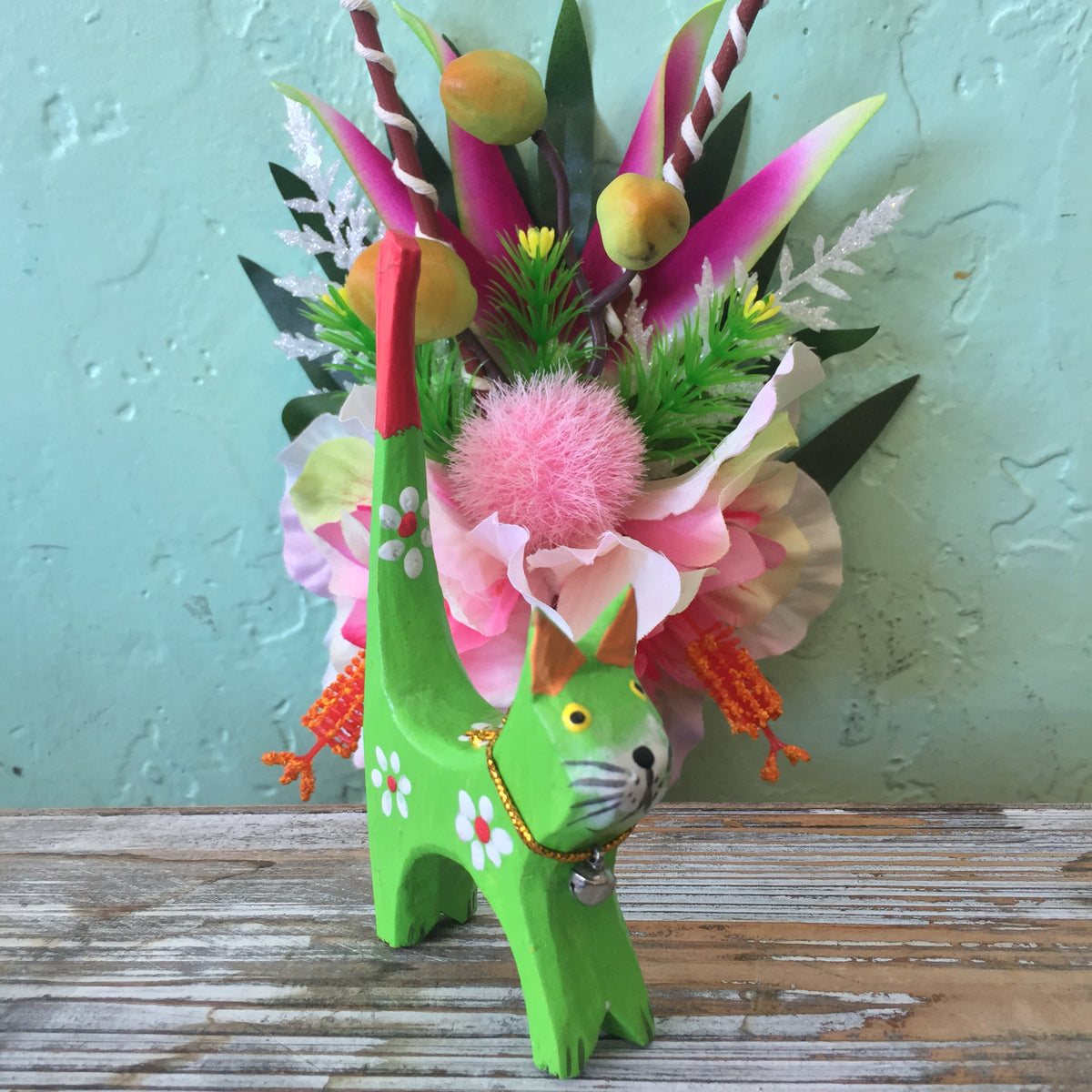 green painted wooden cat ring holder