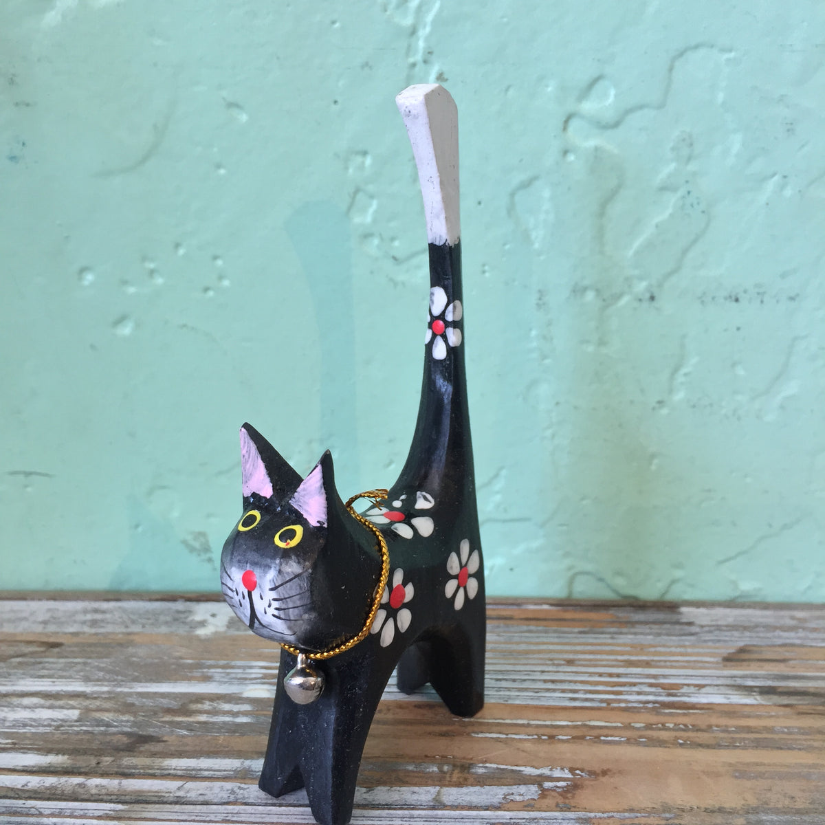 black painted wooden cat ring holder