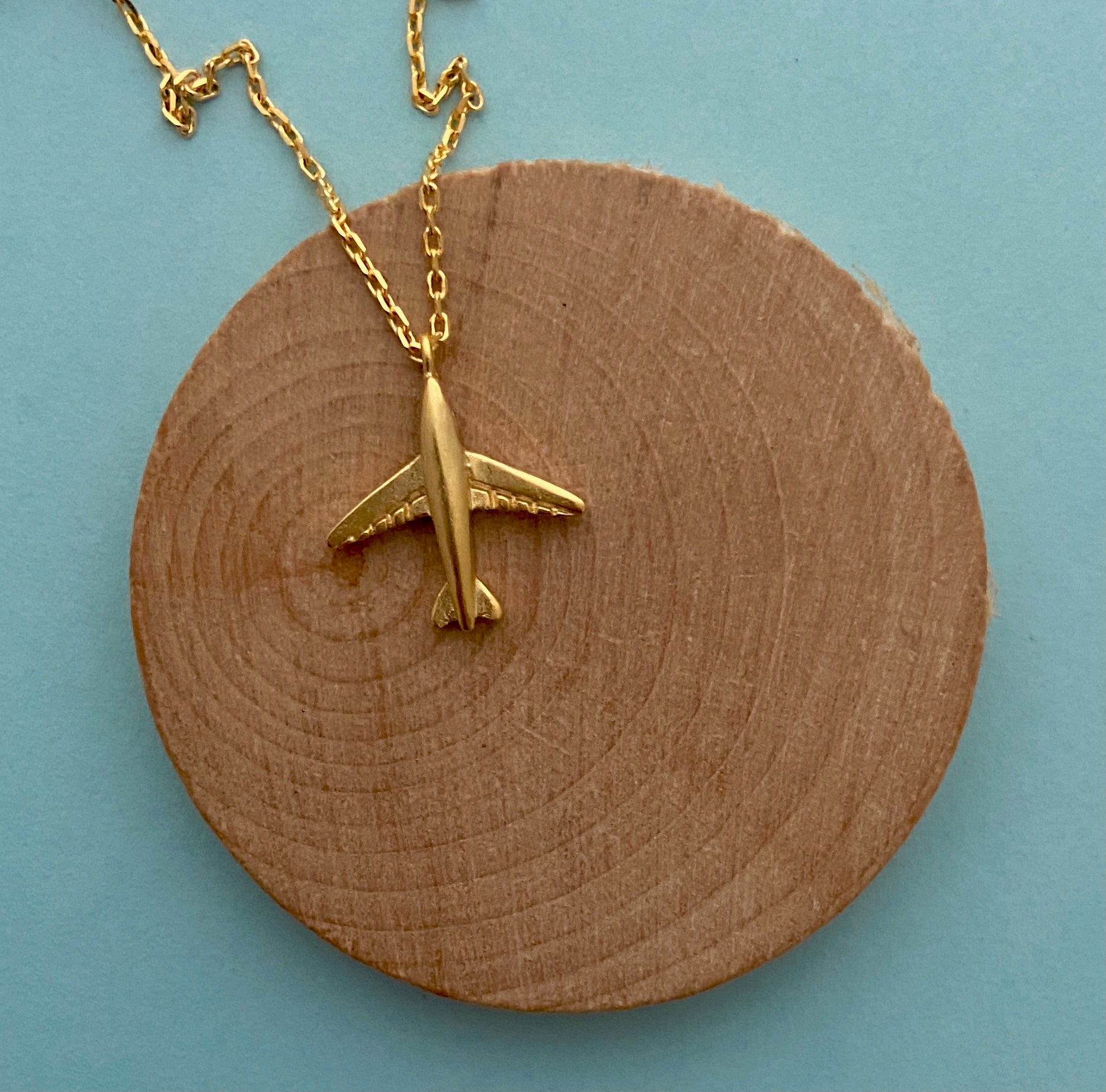 dainty minimalist gold airplane travel necklace