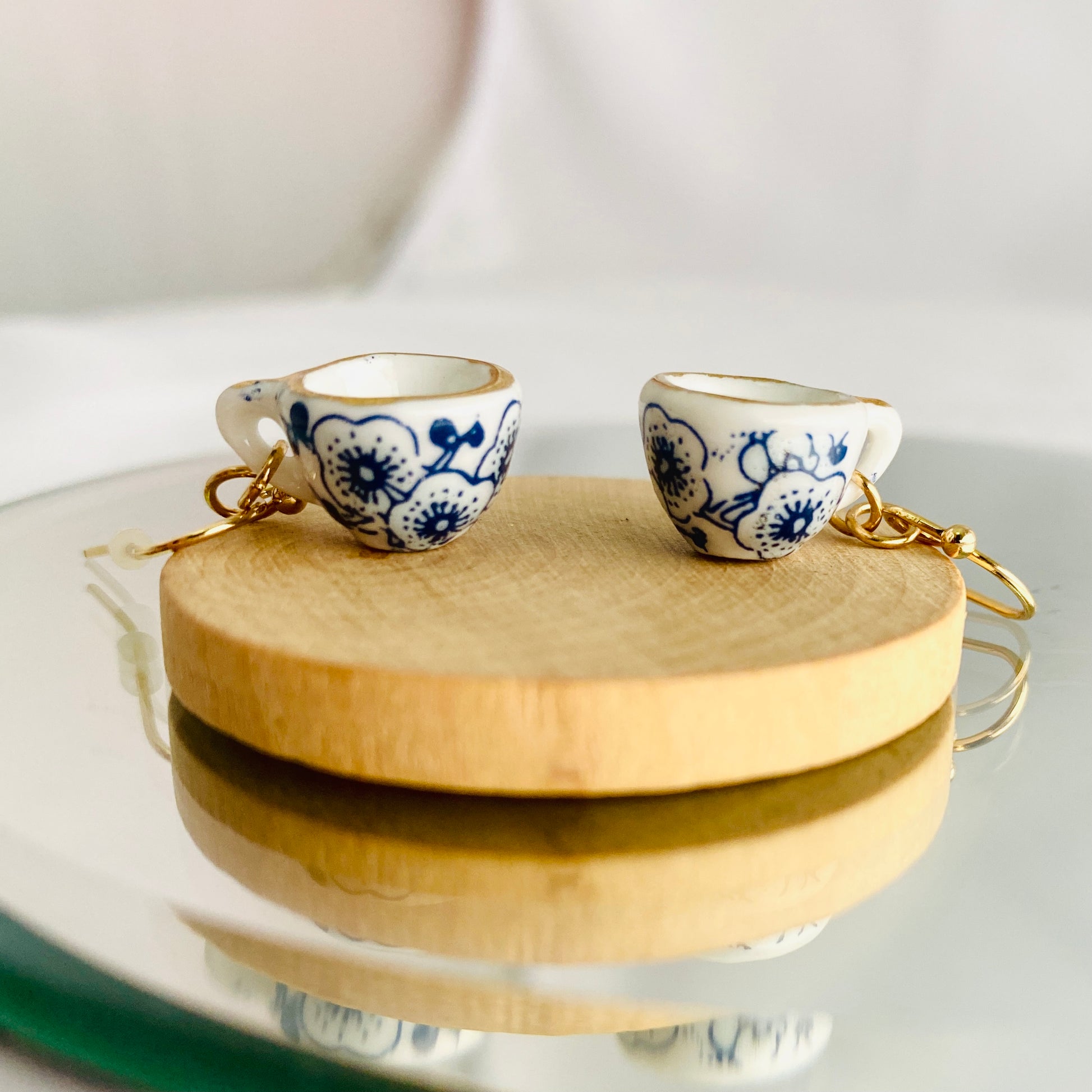 cute miniature porcelain tea cup earrings with blue detail